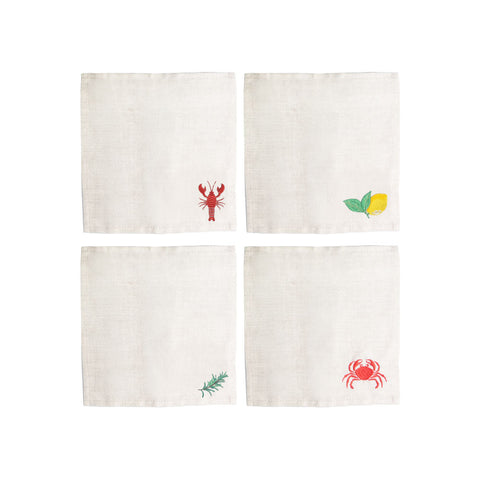 Set of four off-white linen cocktail napkins with colorful embroidered seafood motifs including lobster lemon rosemary and crab