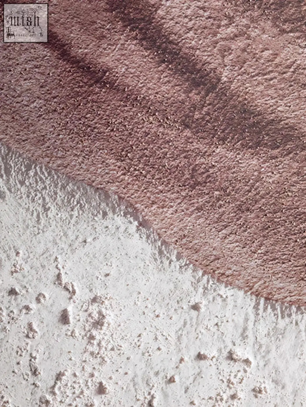 A soft pinkish brown earthy tones textured wall art with a subtle gradient blending into lighter speckled white area