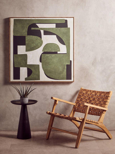 A framed abstract wall art with bold green black and white geometric shapes on textured canvas astratto green textured abstract wall art