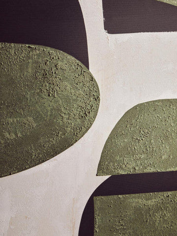 Olive green textured concrete abstract wall art with geometric shapes against a white wall for modern decor