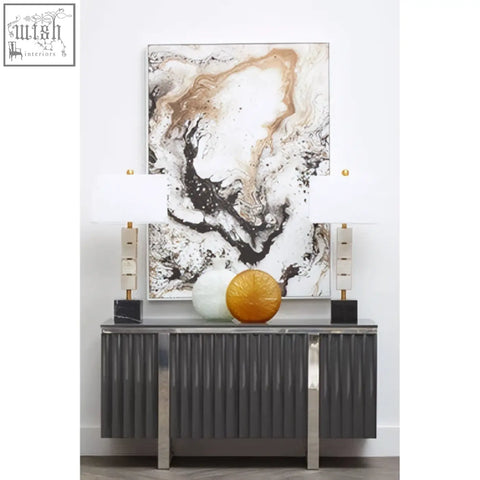 A sleek astratto natural wall art console table with vertical ribbed gray metal panels and polished chrome legs