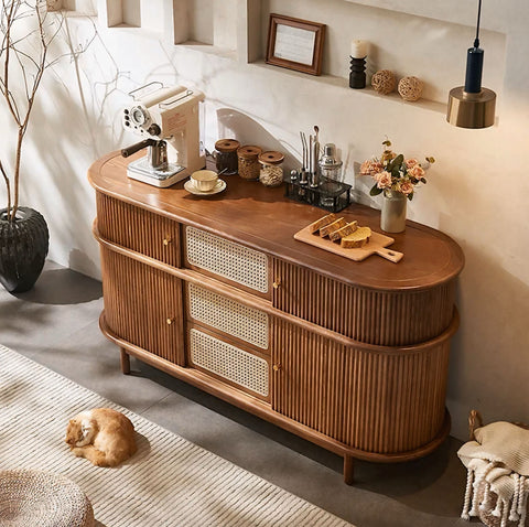 Warm-toned wooden asuka cabinet with vertical slats and three woven cane panel doors for stylish storage