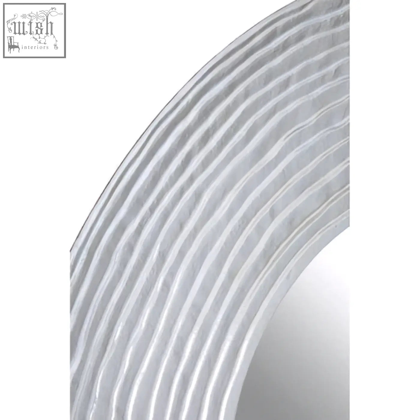 Athena round wall mirror with silver finish featuring a sleek curved frame and subtle horizontal ridges wall mirror