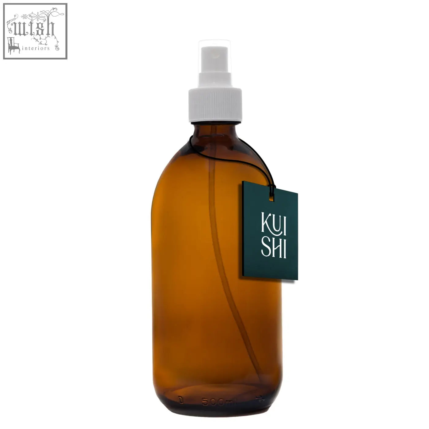 Amber glass spray bottle with white nozzle and dark green kui shi tag to diffuse natural scents easily