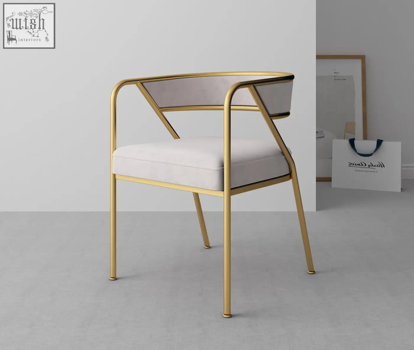 Gold-finished metal frame dining chair with white upholstered seat and backrest in modern minimalist attleboro dining style