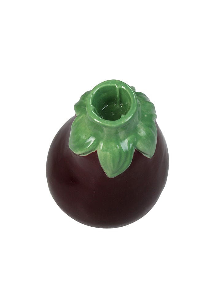 A glossy dark purple ceramic eggplant shaped vase with a green leafy stem top for aubergine dream candle holder