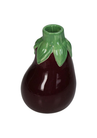 A glossy dark purple ceramic candle holder shaped like an eggplant with a green leafy stem called aubergine dream