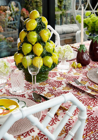 Vibrant yellow and green ceramic lemon tree centerpiece with glossy finish featured as aubergine dream candle holder
