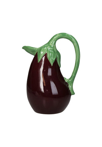 A dark purple glossy ceramic aubergine jug shaped like an eggplant with a green leafy stem handle