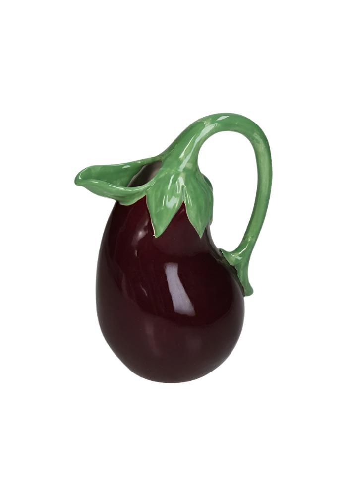 A glossy dark purple ceramic aubergine jug shaped like an eggplant with a green leafy handle and stem