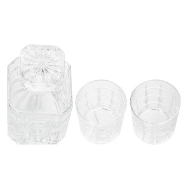 Clear crystal auclair decanter with faceted geometric design and two matching crystal tumblers for serving drinks