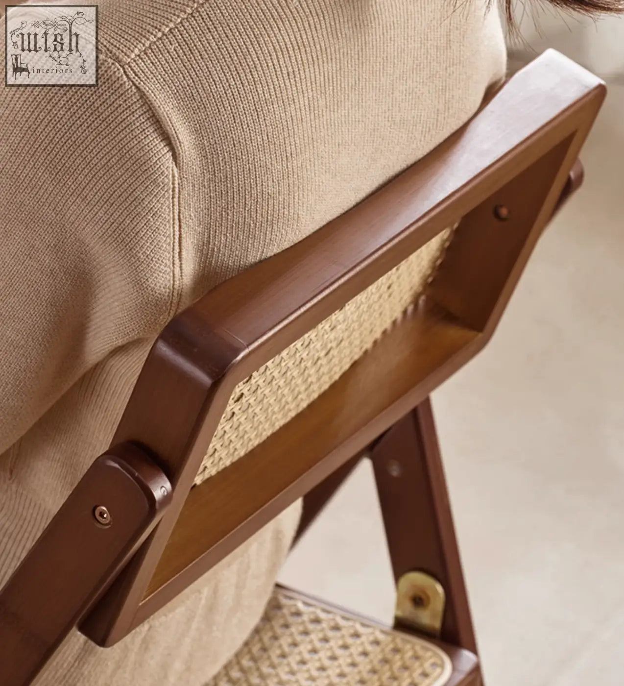 Brown wooden audrey folding dining chair with woven cane backrest and upholstered seat perfect as a dining chair