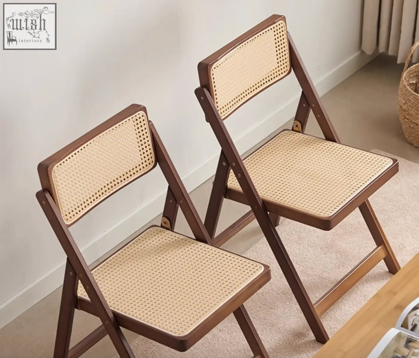 Two dark wood audrey folding dining chairs with woven cane rattan seats perfect for dining chair use