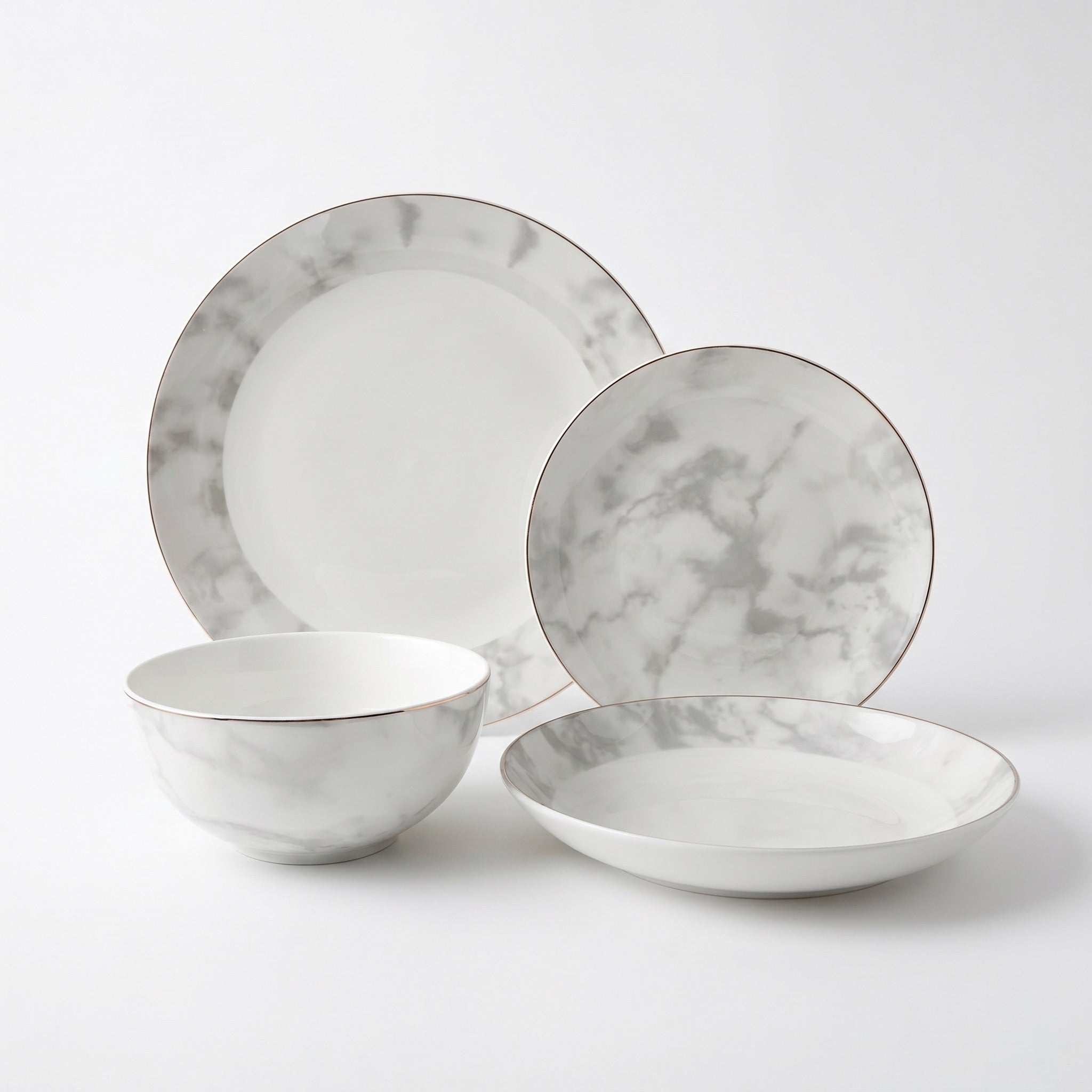 Elegant white fine bone china dinnerware set with gray marble pattern and silver rims aurelia 16-piece set