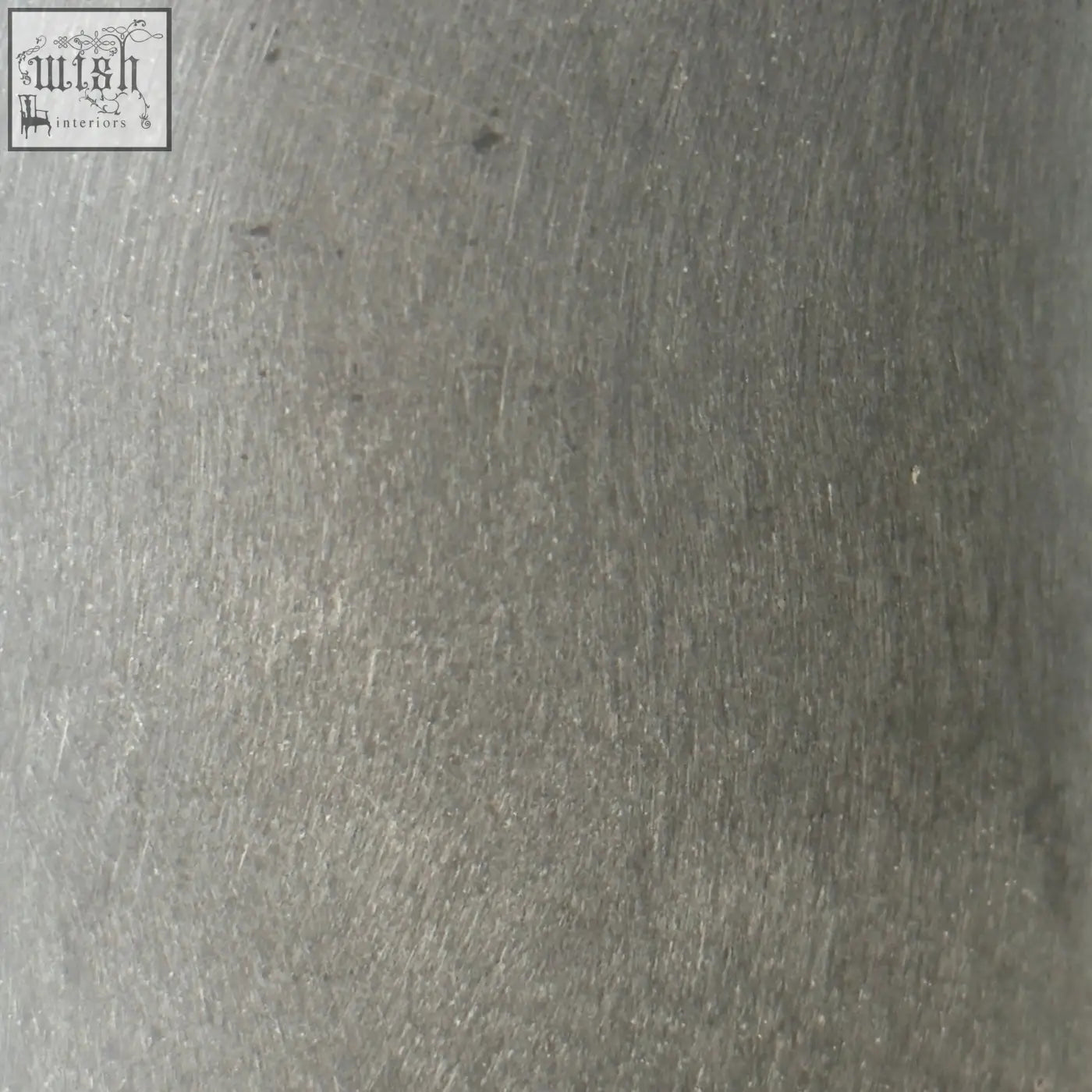 Brushed grey stone resin plant pots with a subtle metallic sheen and fine uniform scratches for indoor use