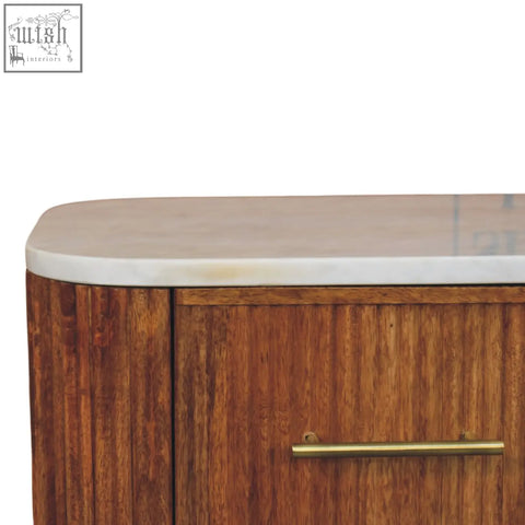 A sleek warm-toned aurora marble bedside table with a white marble top and solid mango wood body with brass handle