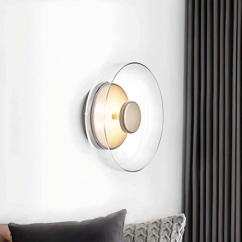 Modern minimalist aurora wall lamp with clear glass dome metallic base and warm circular light source wall lamp
