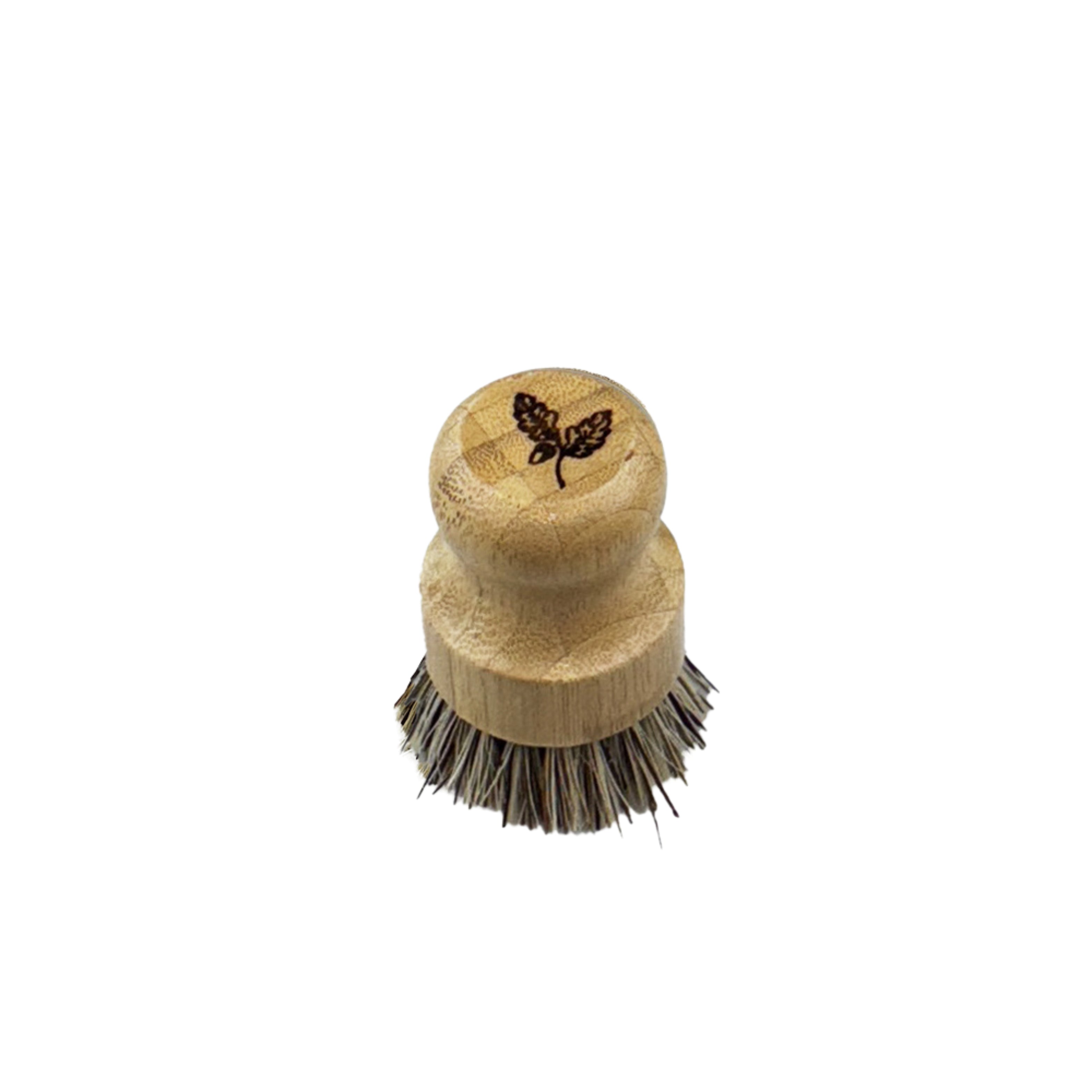 A natural wood-handled bamboo pot brush with gray bristles and a dark brown autumn acorns leaf engraving