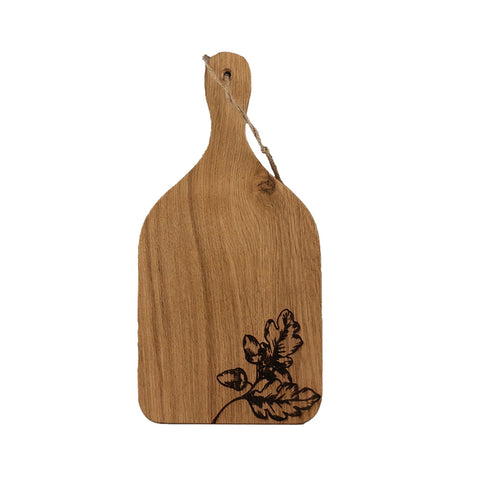 Light brown wooden cutting board with hand carved oak leaf and acorn design and hanging loop called autumn acorns oak hanging paddle