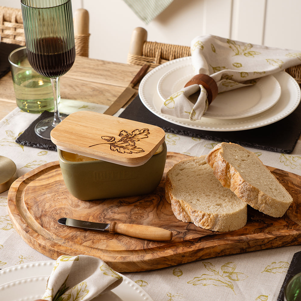 Olive green ceramic sage green butter dish with natural wood lid engraved with oak leaf and acorn design