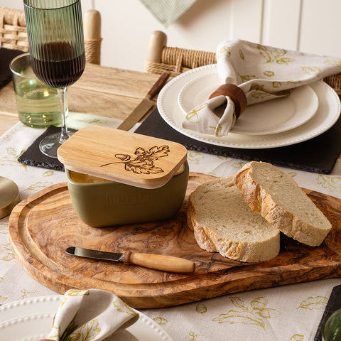 Olive green ceramic sage green butter dish with natural wood lid engraved with oak leaf and acorn design