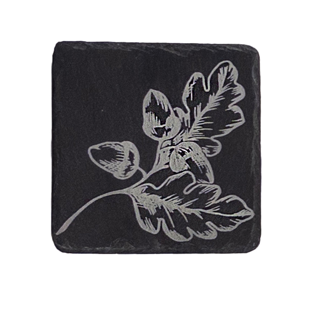 Black slate single slate coaster with light gray engraved oak leaves and acorns design perfect for autumn decor