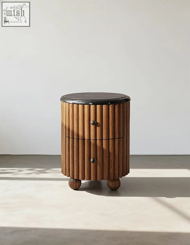 Ava luxe round bedside table with cylindrical wooden slats black marble top and rounded ball feet bedside table
