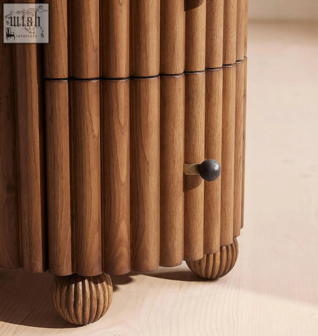 Ava luxe round bedside table with modern wooden vertical slats dark round knob and ribbed spherical feet