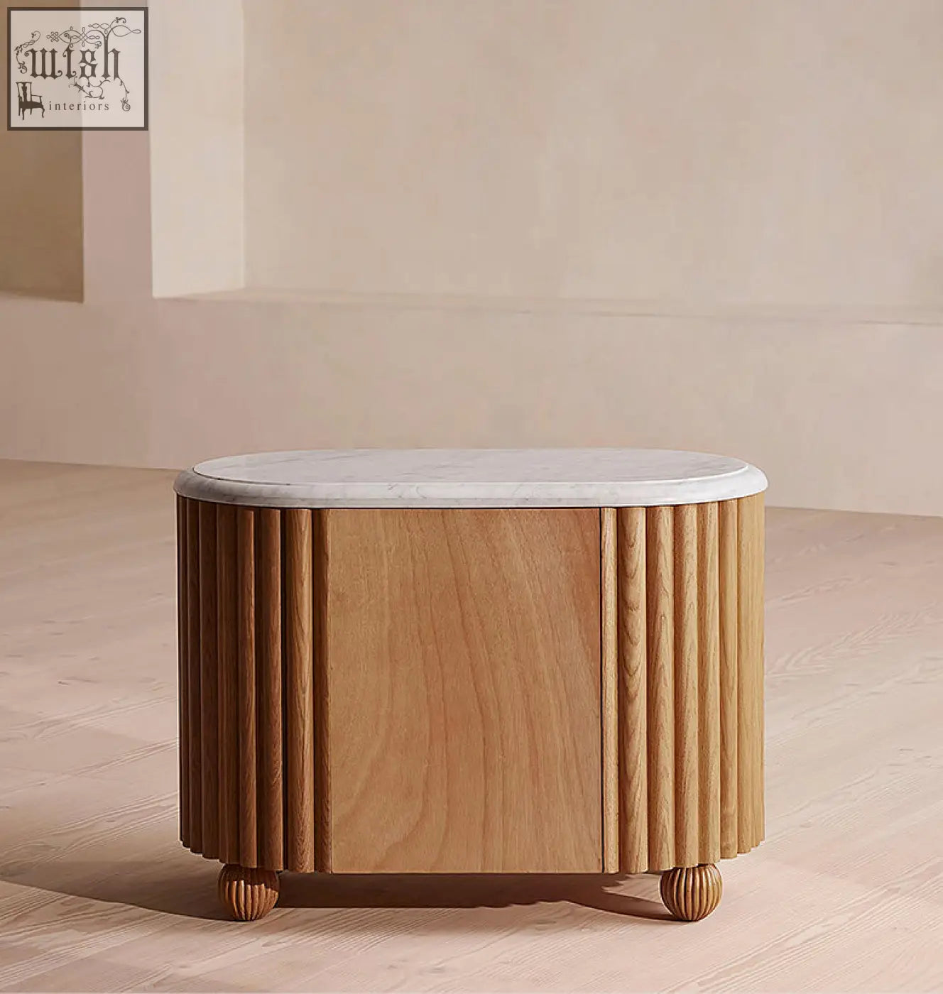 Ava rounded rectangle bedside table with polished white marble top and fluted oak wood sides on rounded feet