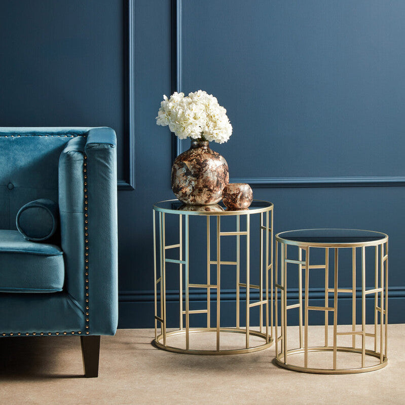 Gold-toned champagne finish round side tables set of 2 with glass tops and geometric lattice design