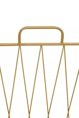 Avento gold finish magazine rack made of gold-colored wire with a sleek minimalist design for stylish storage