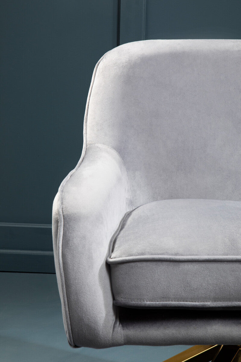 Avery grey velvet swivel chair featuring a plush light gray velvet swivel design with soft cushioned seat and backrest