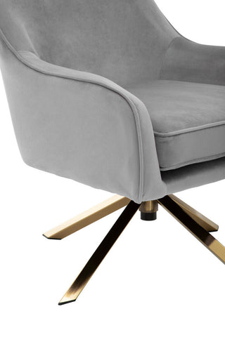 Avery grey velvet swivel chair with soft grey velvet upholstery and gold-tone polished star-shaped base