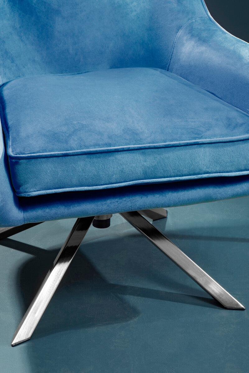 Avery midnight velvet swivel chair in blue velvet with a sleek chrome star base perfect for any room
