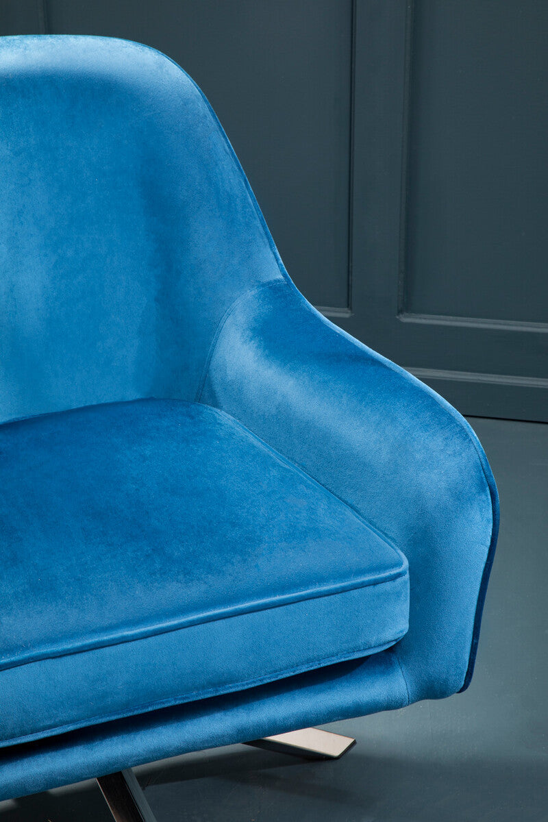 Avery midnight velvet swivel chair in vibrant blue velvet with sleek metal legs and a modern design velvet swivel chair