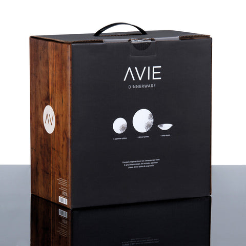 Black and wood-textured box for avie botanic 12-piece dinner set with minimalist white branding and plate illustrations
