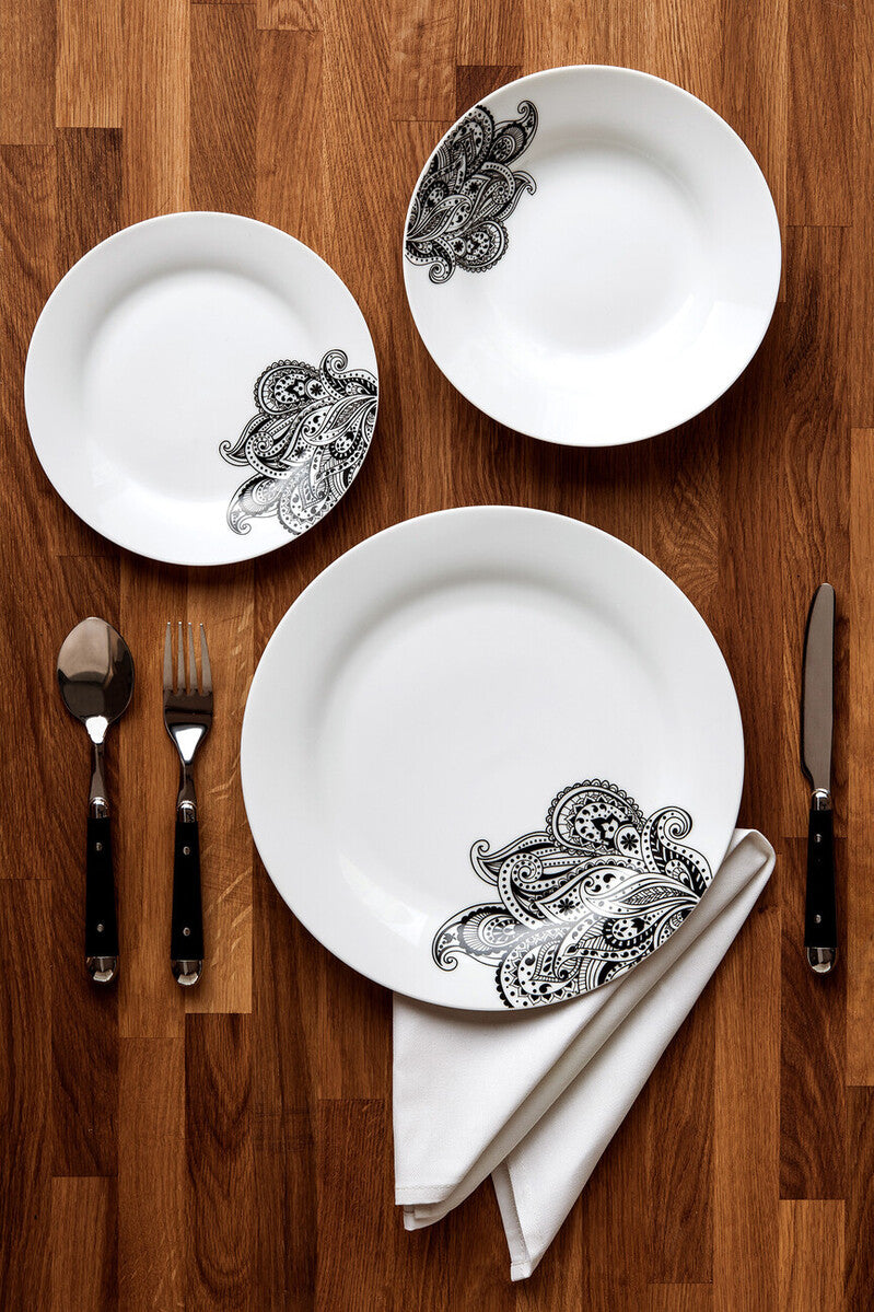 Set of three white ceramic plates with black paisley edge design from avie prince black dinner set