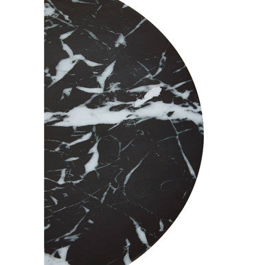Black marble effect circular top with white veins on a gold base side table for stylish living spaces