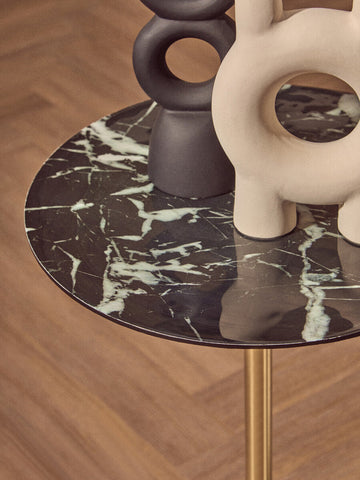 Avola side table with black marble effect top and sleek gold base perfect for stylish living spaces