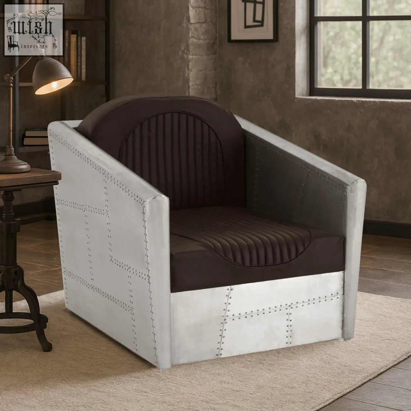 Avro armchair with a sleek silver metallic frame and dark brown faux leather upholstered seat and backrest
