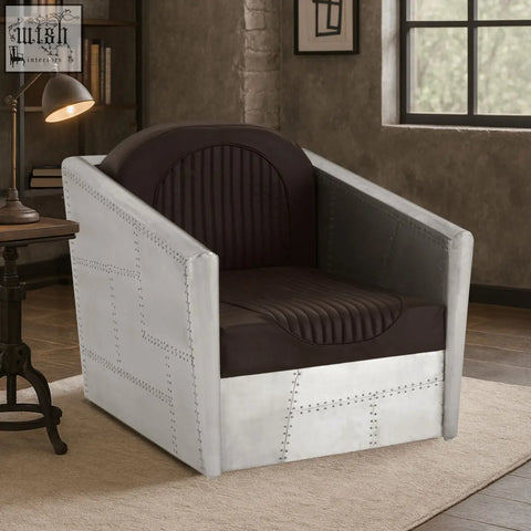 Avro armchair with a sleek silver metallic frame and dark brown faux leather upholstered seat and backrest