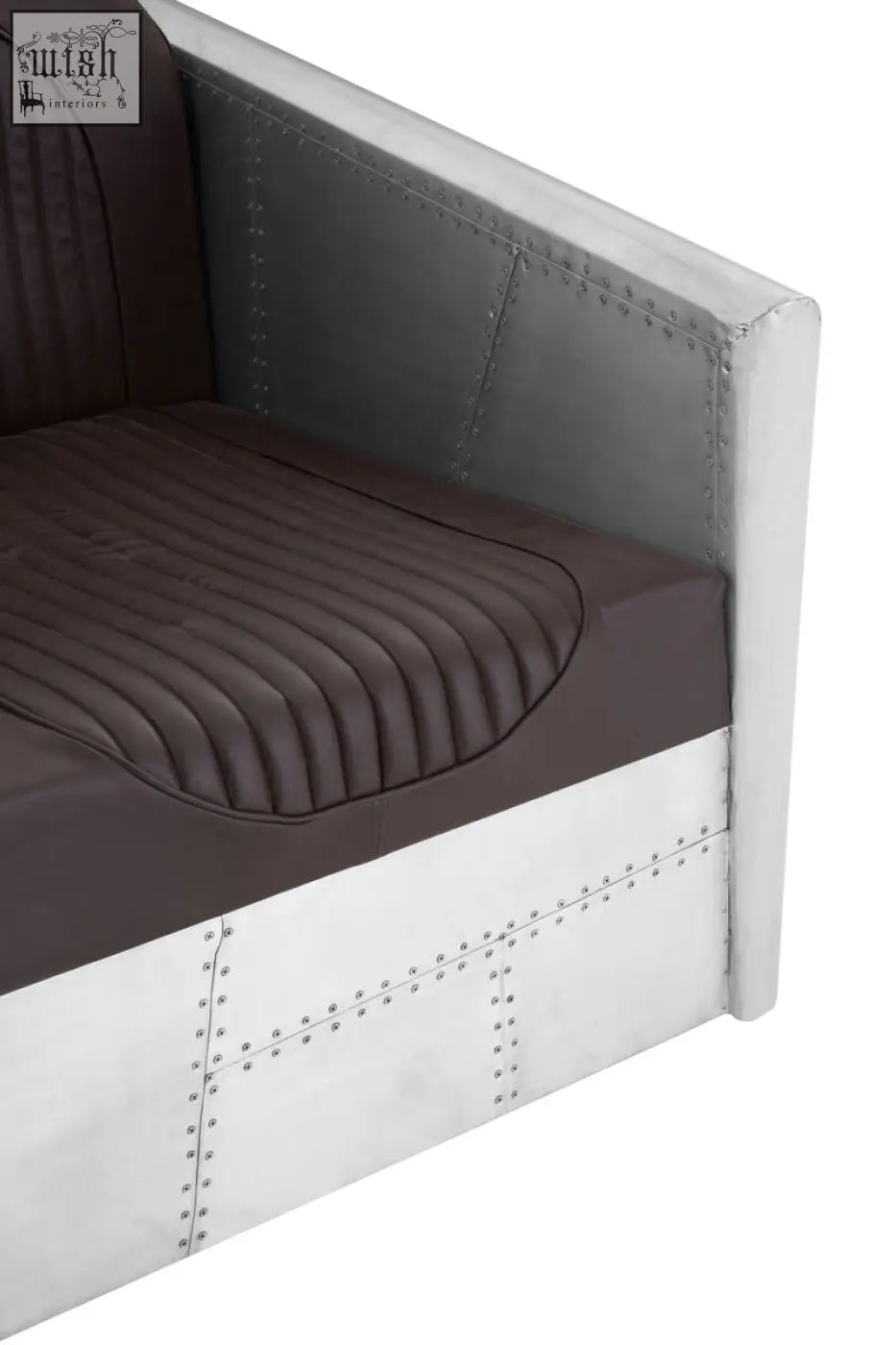 Avro armchair with dark brown faux leather quilted seat and silver metal panels with rivet accents