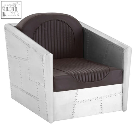 Avro armchair with a sleek white metal frame and dark brown faux leather ribbed upholstery for modern seating