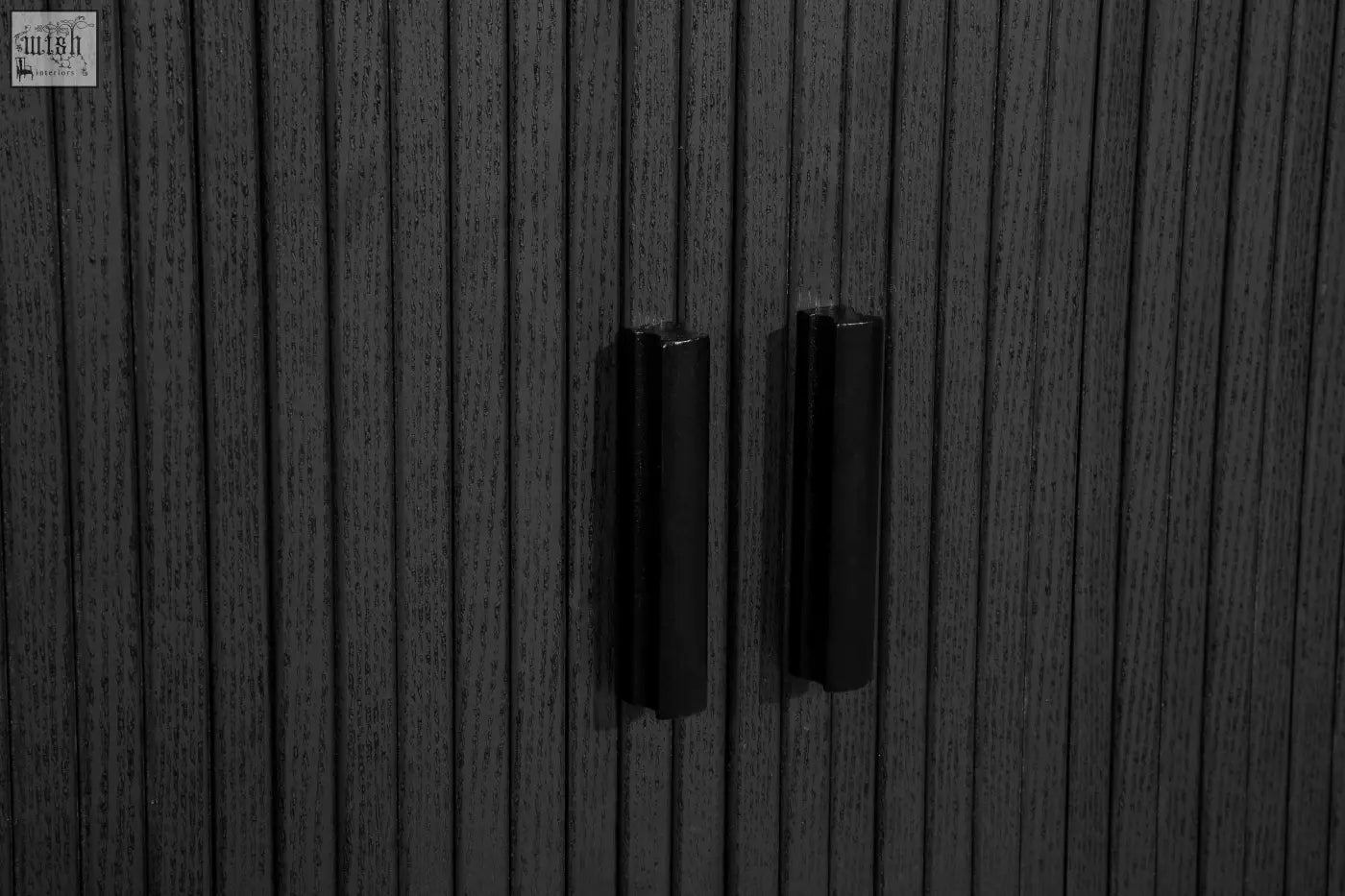 Black sleek rectangular matte cabinet handles on Axel 2 door fluted sideboard for fluted dining range use
