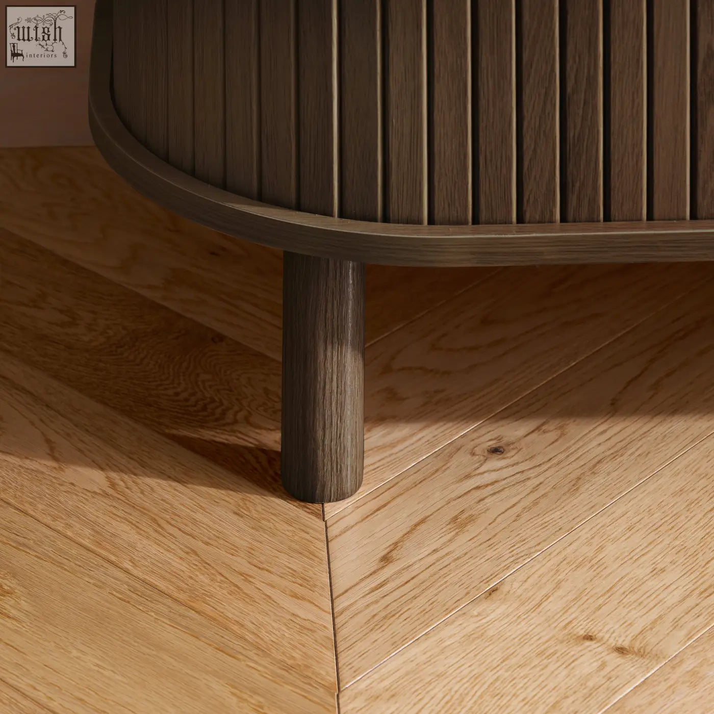 Dark wood slatted coffee table with curved edges and cylindrical legs perfect for fluted dining range setups
