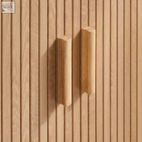 Light oak wood cabinet handles with smooth rounded rectangular design on axel 2 door fluted dining sideboard