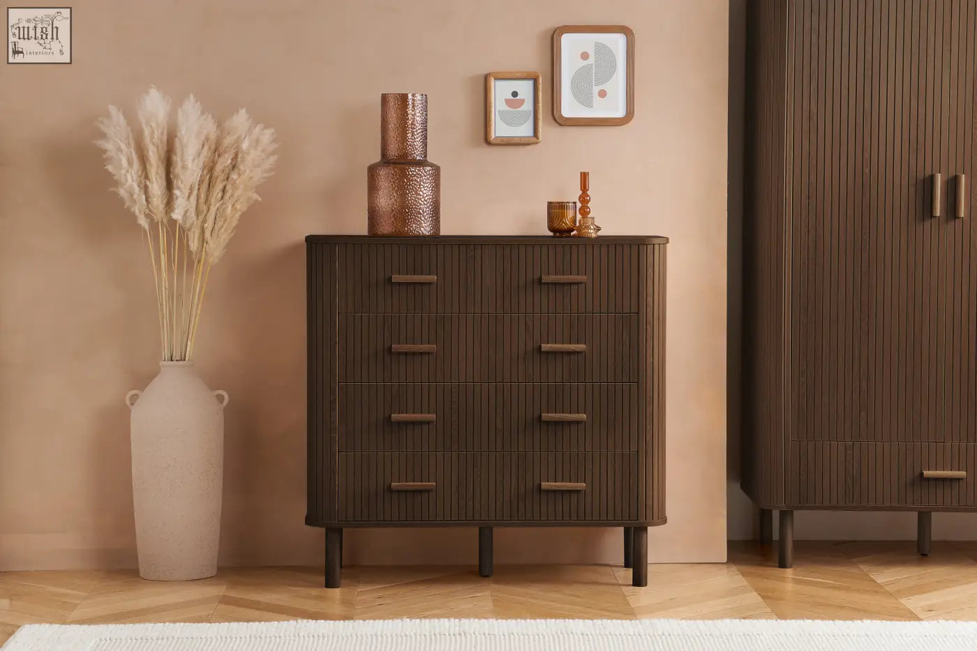 Dark brown wooden axel 6 drawer chest with vertical slats and matching handles from fluted bedroom range