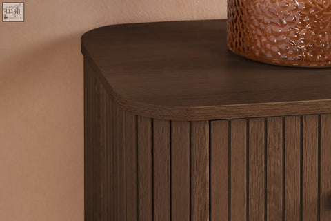 Dark brown wooden axel 6 drawer chest with vertical slats and curved top from the fluted bedroom range