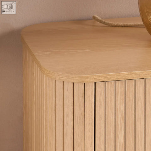 Axel 6 drawer chest in light oak with fluted bedroom range style vertical slat paneling and rounded top edge