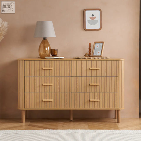 Light wood slat-front axel 6 drawer chest with tapered legs part of the fluted bedroom range bedroom range